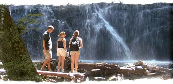 Hikers at the base of Crabtree Falls